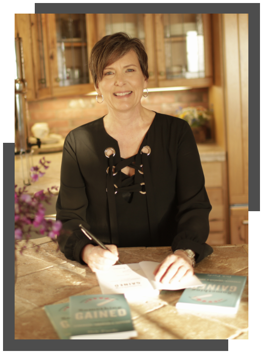Group 3583 Deb Purdy Signing a copy of her book