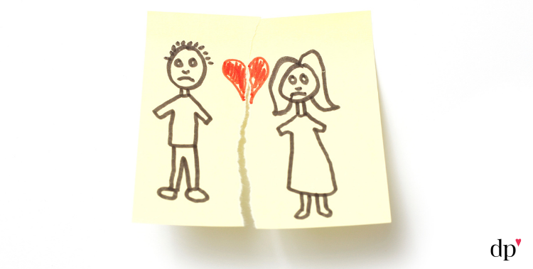 stick figure of man and woman on a post it note that's ripping in half