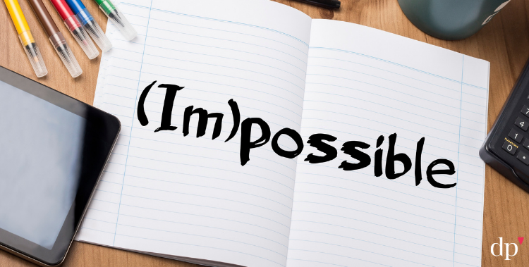 I'm Possible written with black market on a notebook